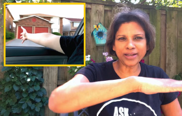 An educator demonstrates 'drag' with her arm.