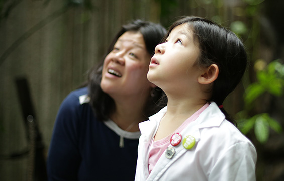 A mother and daughter enjoying the rain forest at the Science Centre.