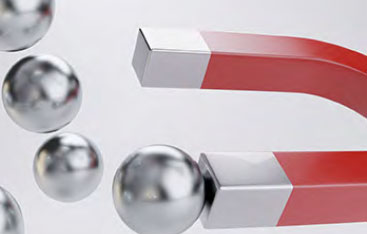 Magnetic balls and a traditional U-shaped magnet.