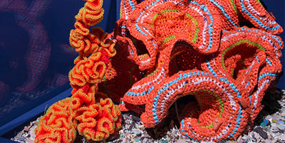 A close up of crochet coral.