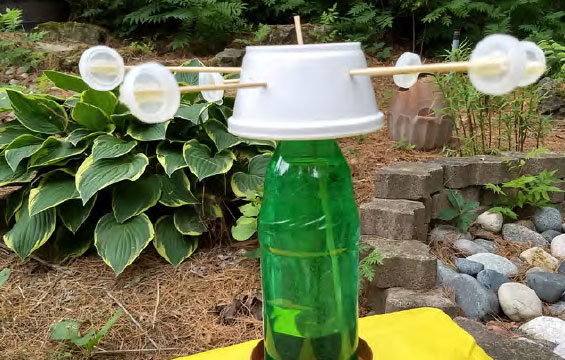 A weather instrument made out of household items.