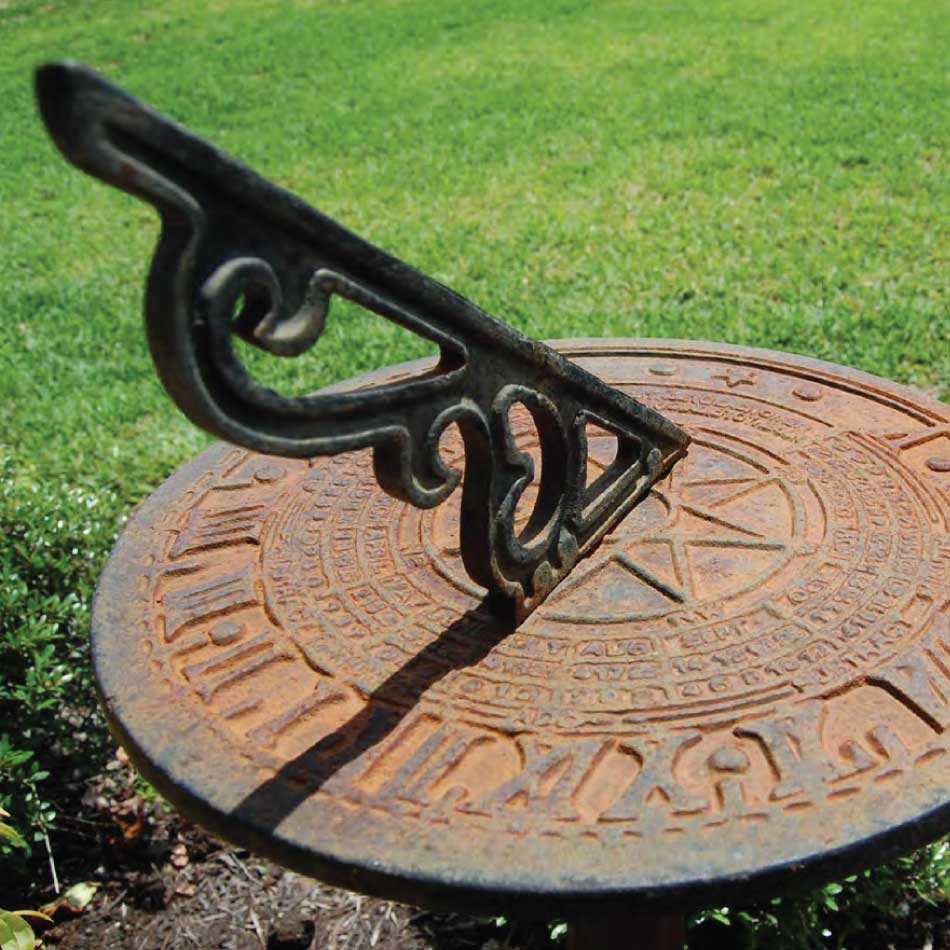 An ornate, old-fashioned sundial.