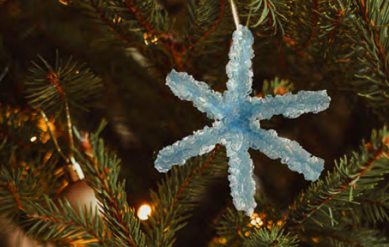 A crystal snowflake used as a Christmas tree ornament.