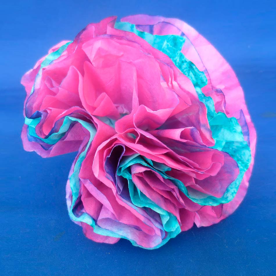 A colourful model of coral made out of coffee filters