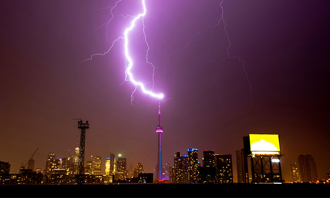 Lightning striking the CN Tower at night.