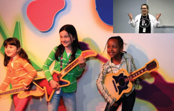 Three children dance holding toy guitars, with an inset of an educator in the top right corner