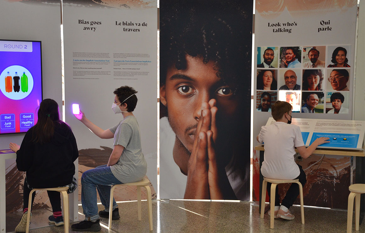 People interacting with the exhibition.