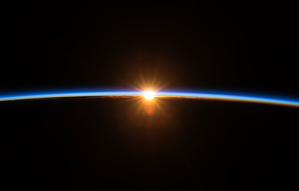 Sunrise over the curve of the Earth.