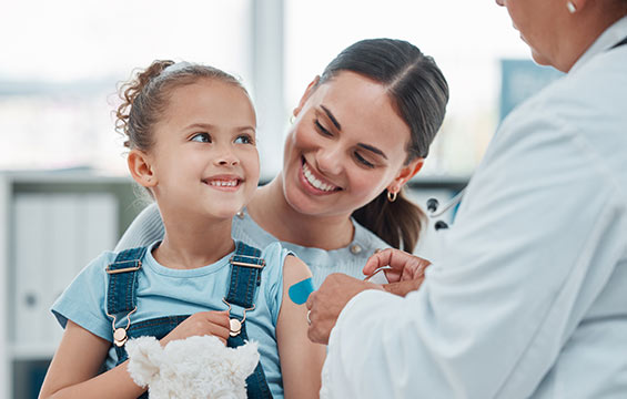 A girl receiving a vaccine.