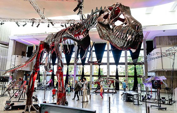 A metal sculpture of a T Rex.