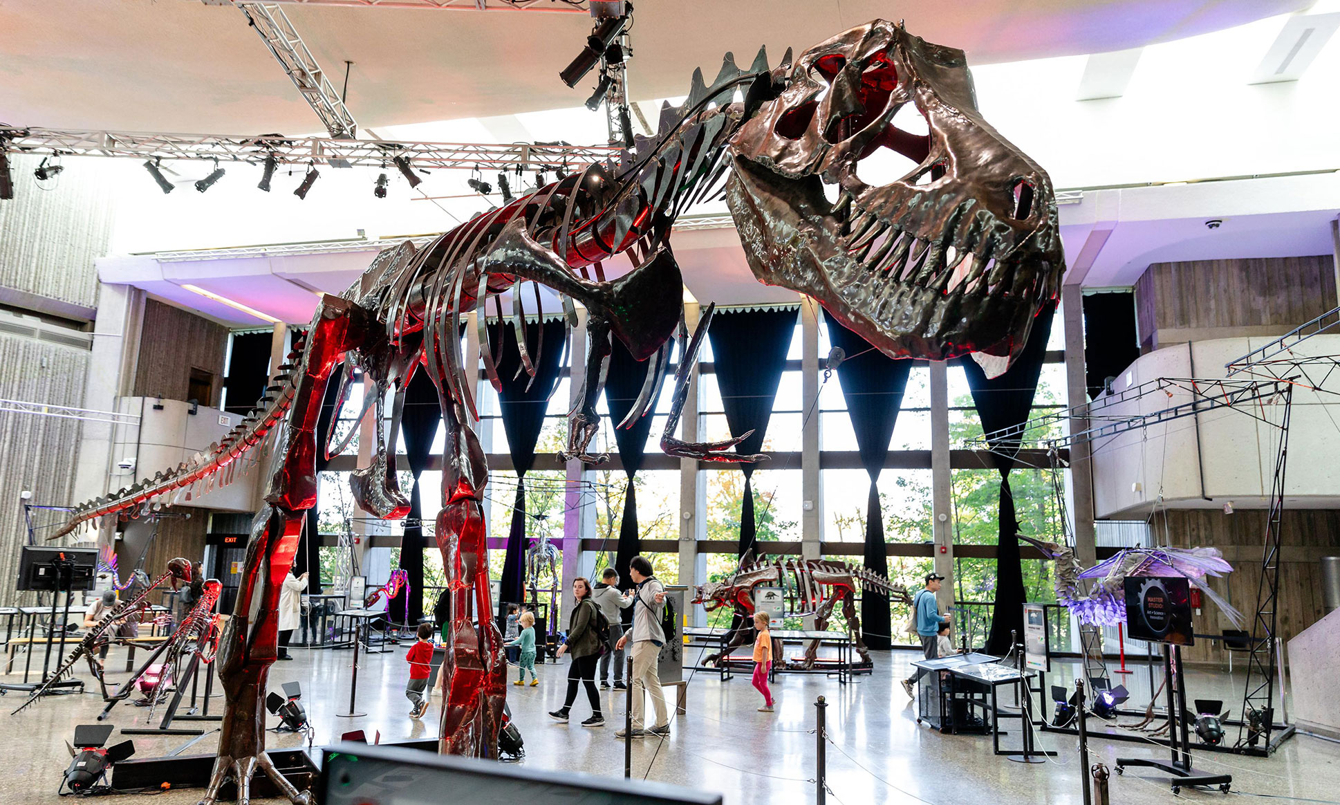 A metal T Rex sculpture.