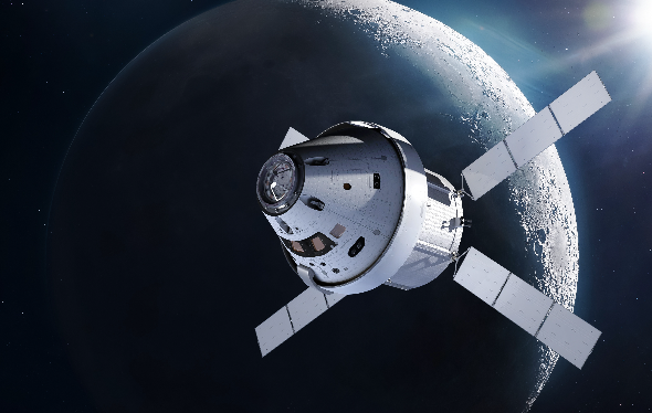 A satellite in front of the moon.